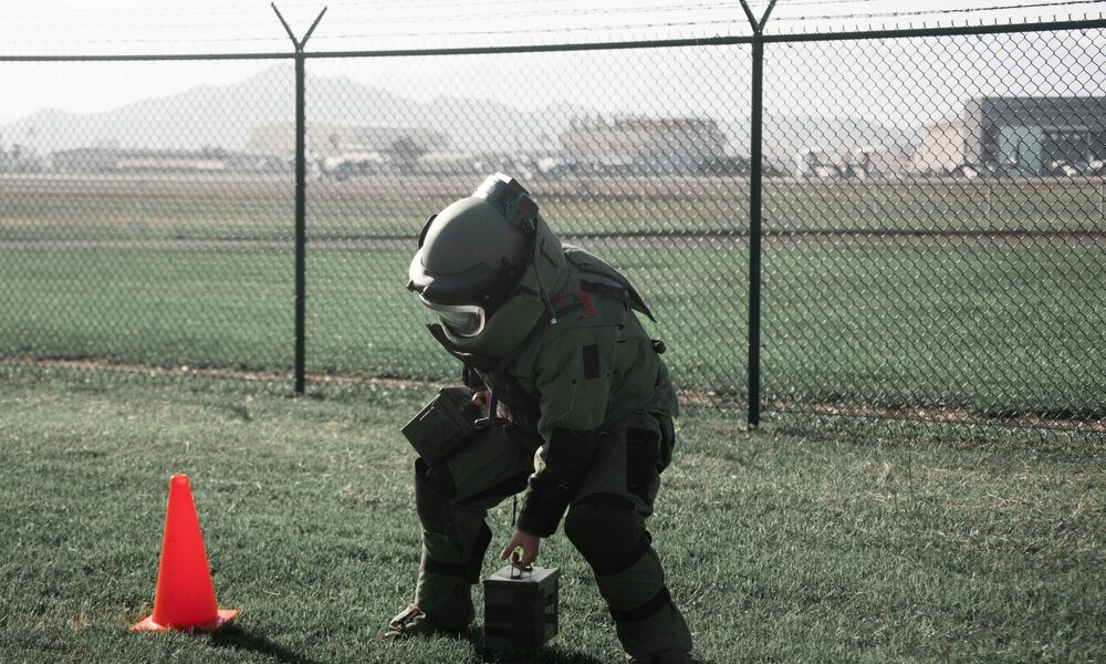 Marine Corps EOD technician performing bomb suit agility test