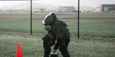 Marine Corps EOD technician performing bomb suit agility test