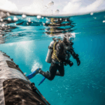 military diver in full scuba gear entering ocean water from 20260331 094319